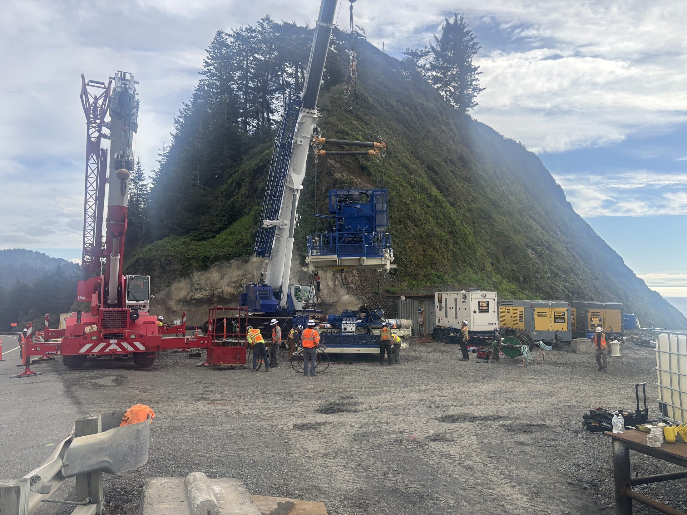 Drill rig and crane at a Pacific Northwest dam site