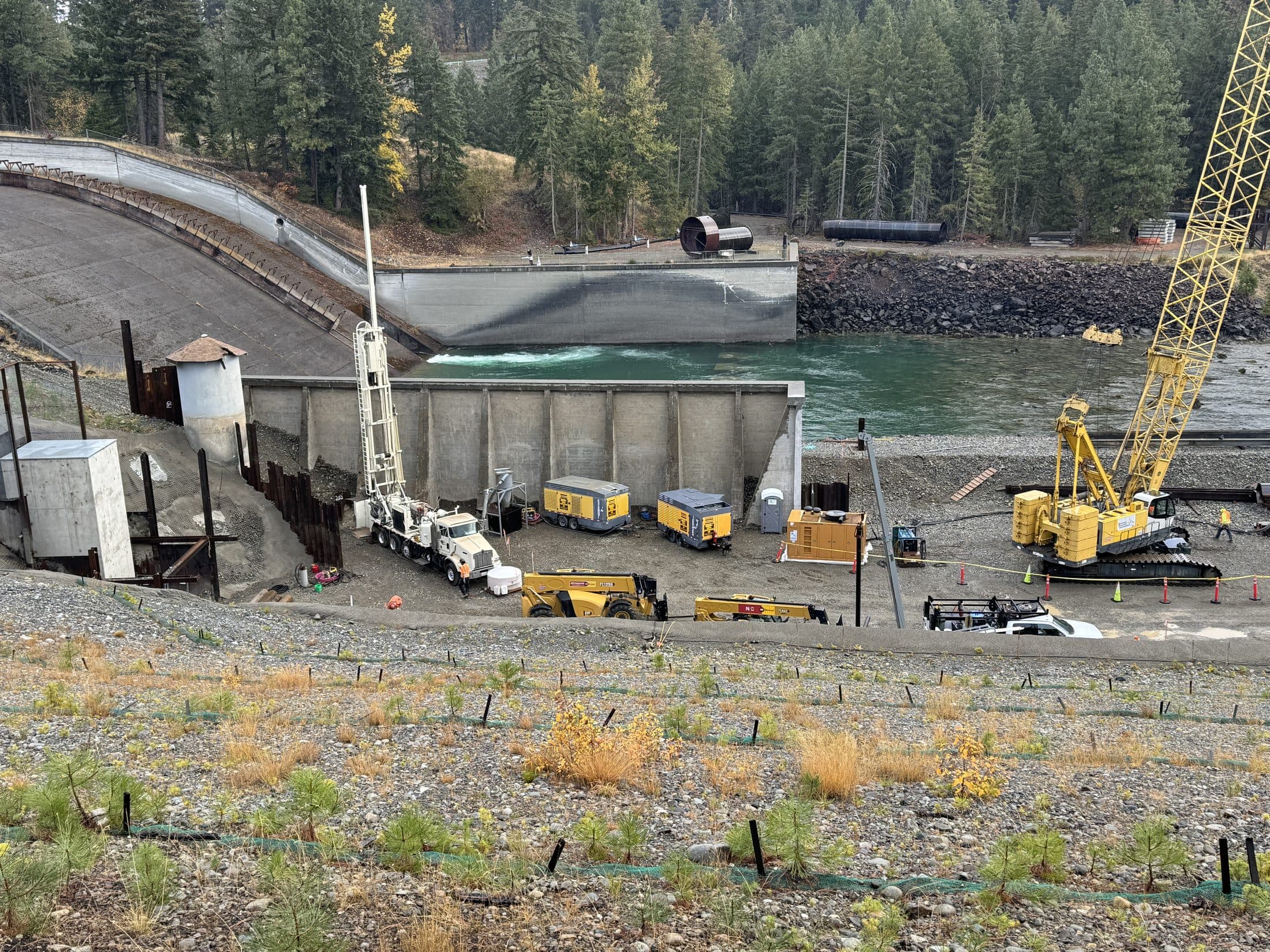 Jensen Drilling drill rig and equipment at the Cle Elum Dam stilling basin