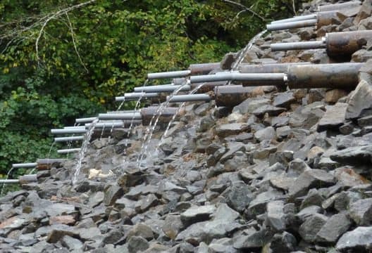 Jensen Drilling horizontal drains flowing on the US 20 corridor